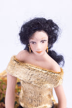 Load image into Gallery viewer, Hand made Porcelain Doll with Gold Lame Top, Legs Crossed