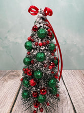 Load image into Gallery viewer, Artisan Hand Decorated Snow Frosted Medium Christmas Tree Red & Green Ornaments With Red Bow