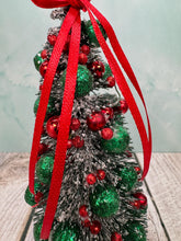 Load image into Gallery viewer, Artisan Hand Decorated Snow Frosted Medium Christmas Tree Red & Green Ornaments With Red Bow