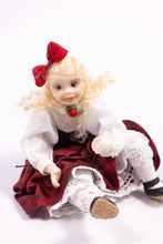 Load image into Gallery viewer, Little Girl Doll in Victorian Red & White Dress with Bow in Long Blonde Hair Sitting Down Pat Melvin Artisan Made