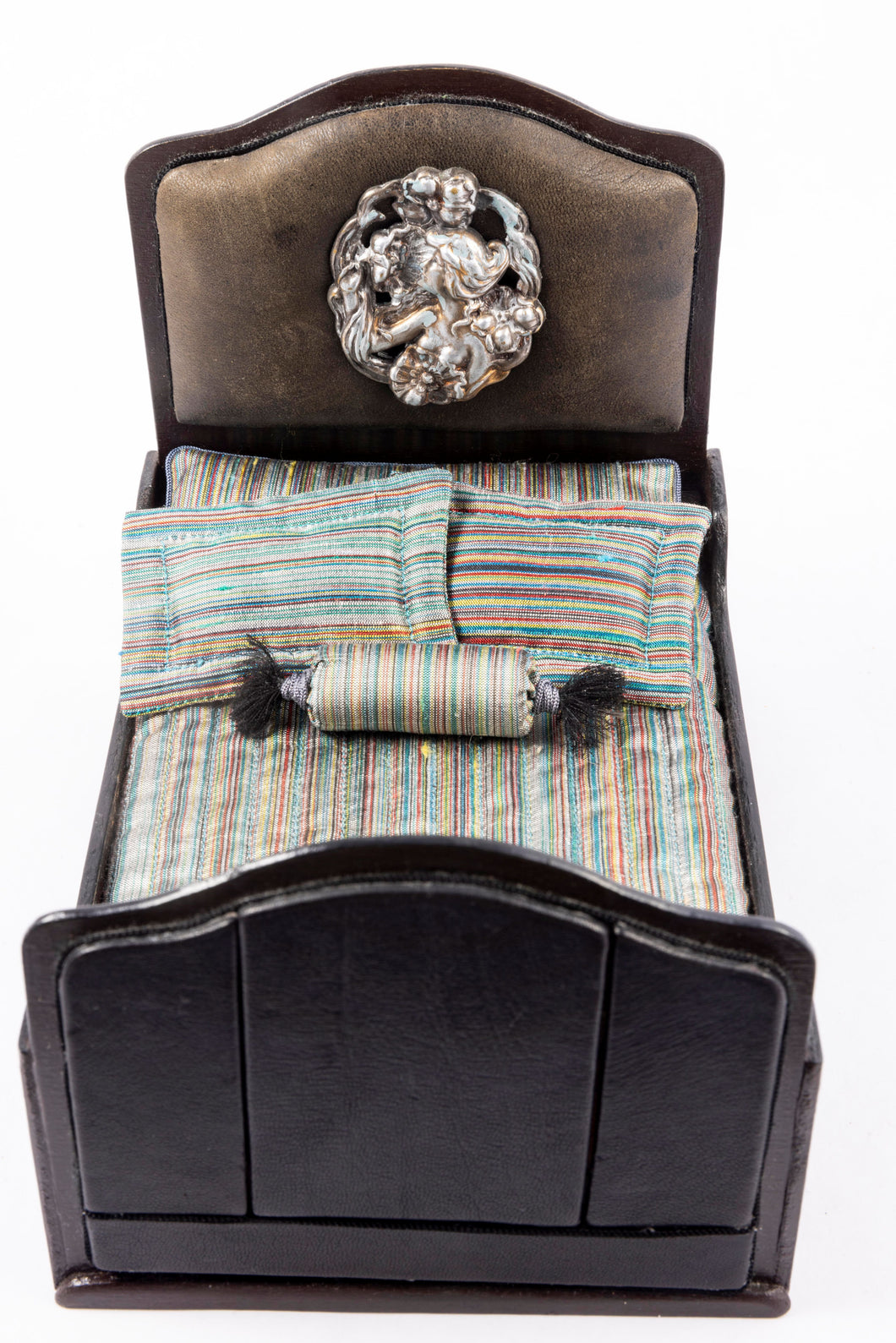 Black Faux Leather Bed with Striped Linens