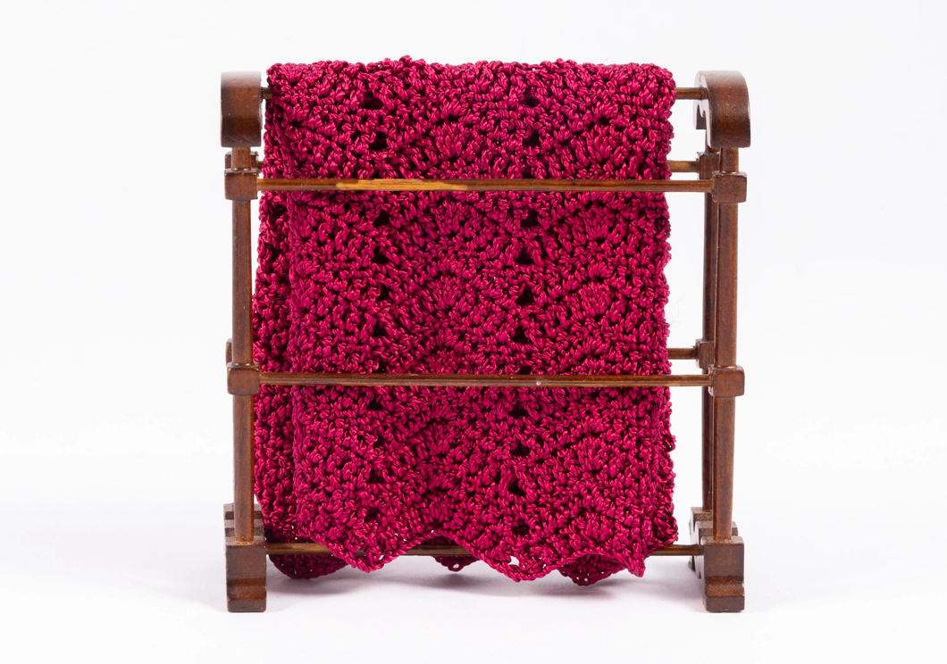 Wooden Quilt Rack with Burgundy Afghan