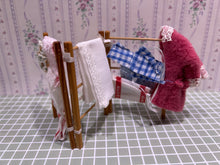 Load image into Gallery viewer, Laundry on Clothes Horse
