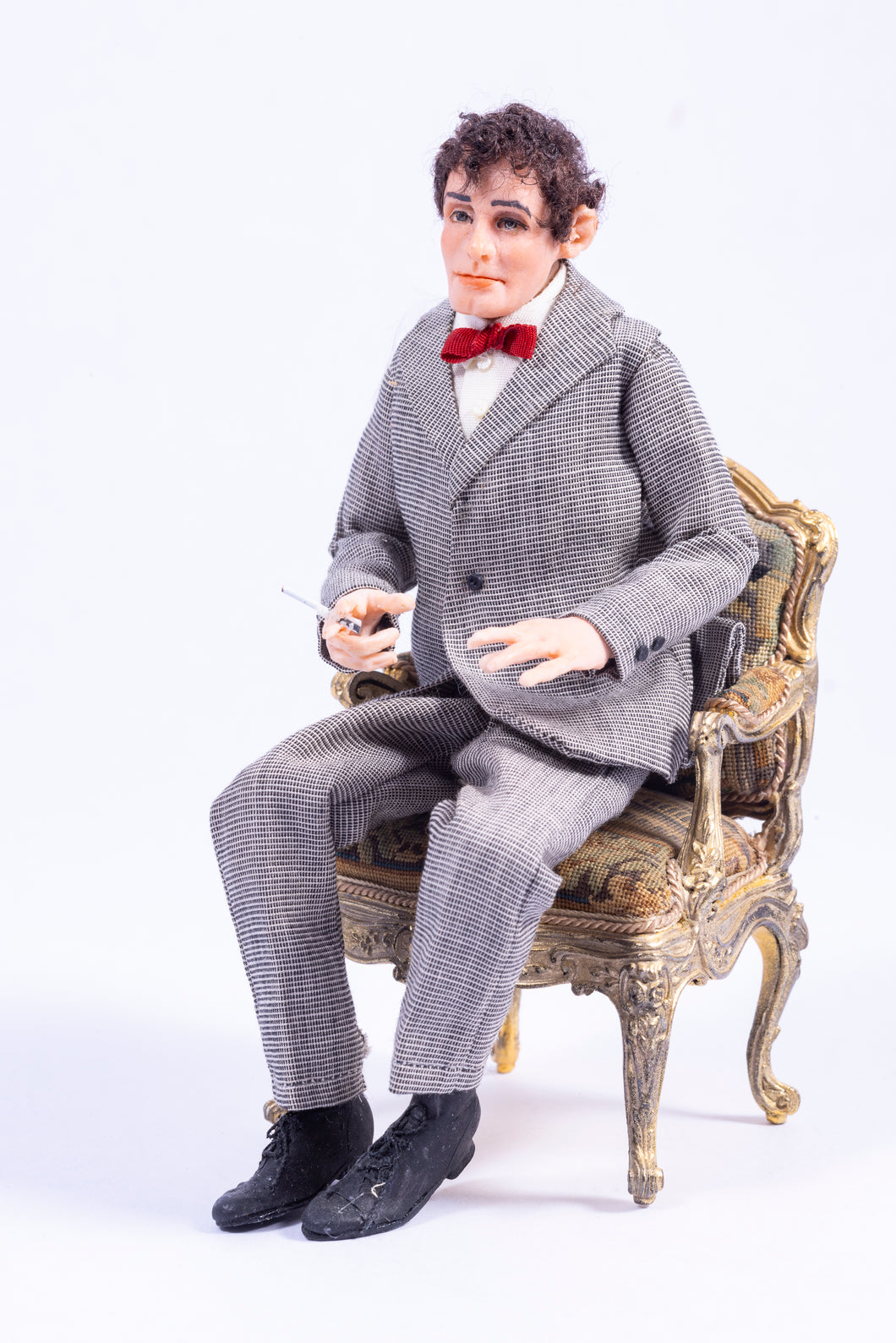 Artisan Made Hand Sculpted Male Doll Holding Cigarette