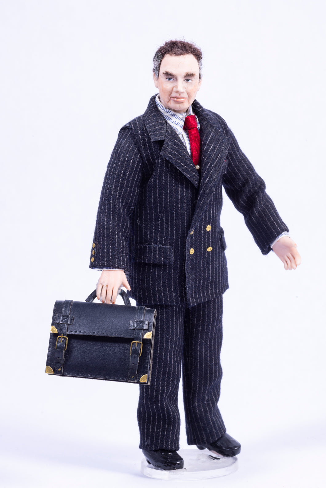 Hand Sculpted Businessman with Briefcase