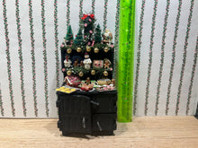 Load image into Gallery viewer, Decorated Black Cabinet with Cookies, Gingerbread Men, Etc. for Christmas
