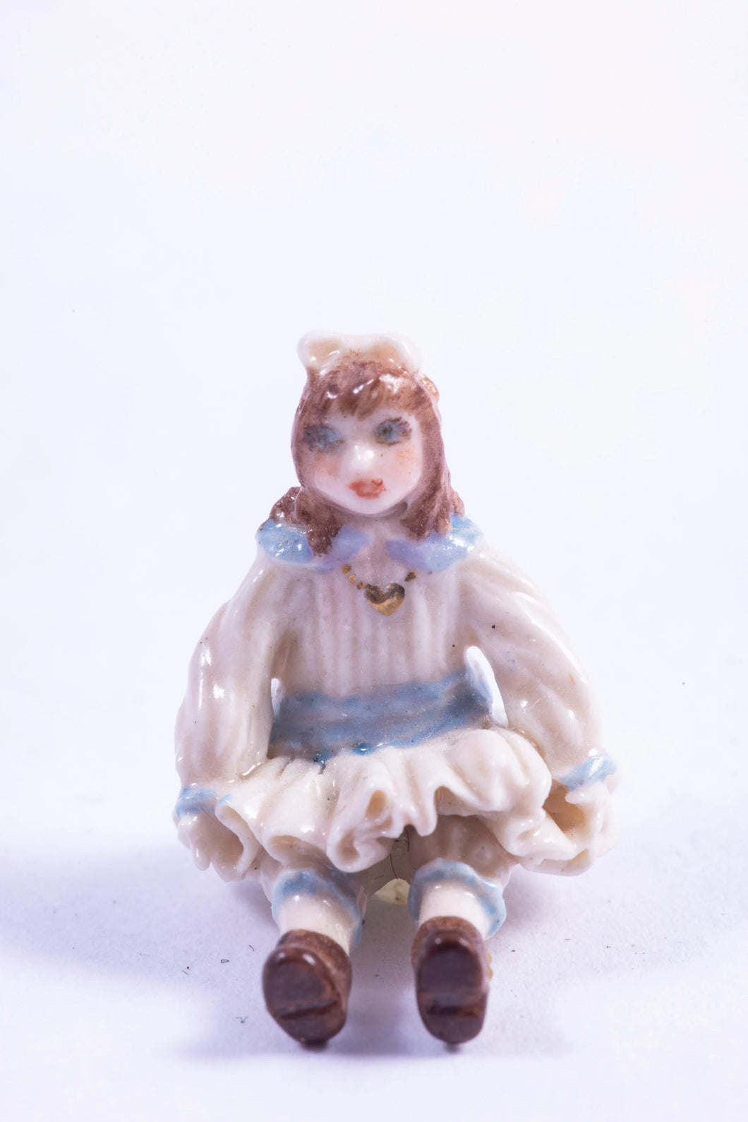 Tiny Handmade Porcelain Little Girl in Sitting Position