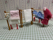 Load image into Gallery viewer, Laundry on Clothes Horse
