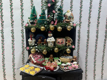 Load image into Gallery viewer, Decorated Black Cabinet with Cookies, Gingerbread Men, Etc. for Christmas
