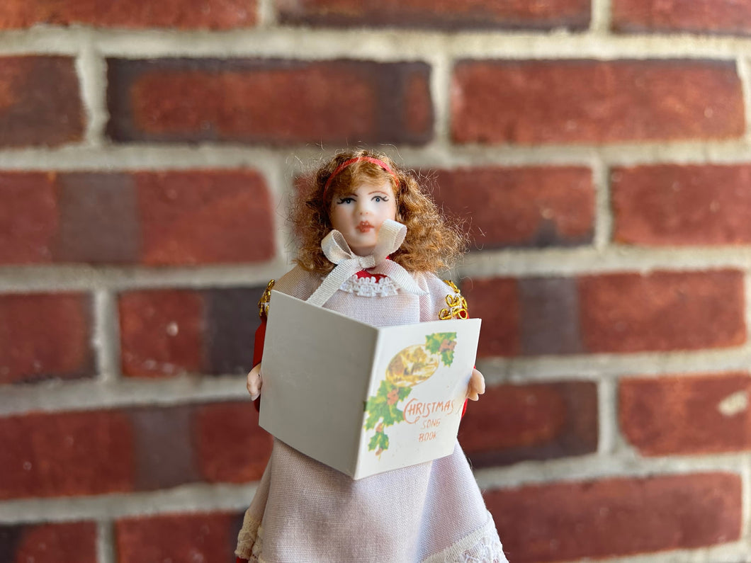 Little Girl Doll Christmas Caroler Holding Sheet Music Book