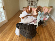 Load image into Gallery viewer, Signed MT BT 1999 Mother &amp; Baby Doll in Brown Wicker Chair
