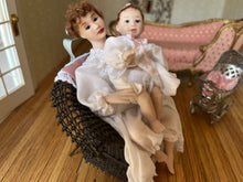 Load image into Gallery viewer, Signed MT BT 1999 Mother &amp; Baby Doll in Brown Wicker Chair
