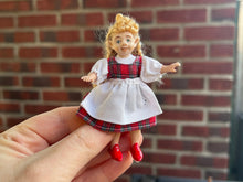 Load image into Gallery viewer, Dollhouse Miniatures ~ Christmas Elf Little Girl Doll in Red Plaid Tartan Dress and White Apron
