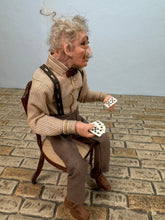 Load image into Gallery viewer, Dollhouse Miniature ~ Artisan Hand Sculpted Man Playing Cards Doll Sitting In Chair
