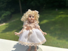 Load image into Gallery viewer, IGMA Artisan Betsy Rouse Porcelain Blonde Little Girl Doll in White Dress
