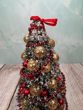 Load image into Gallery viewer, Dollhouse Miniature  ~ Artisan Hand Decorated Snow Frosted Medium Christmas Tree Gold Ornaments &amp; Red Bow
