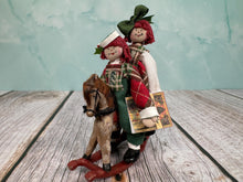 Load image into Gallery viewer, Dollhouse Miniature  ~ Artisan Handmade Christmas Dolls On Rocking Horse
