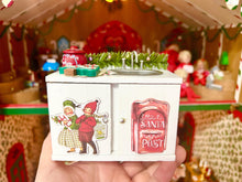 Load image into Gallery viewer, Dollhouse Miniature  ~ 6 Piece Christmas Decorated White Kitchen Set - Sink, Stove, Fridge, Table, &amp; 2 Chairs - Santa, Holiday, OOAK
