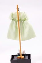 Load image into Gallery viewer, Dollhouse Miniature ~ Light Green Little Girl&#39;s Dress with White Socks and Shoes on Wooden Clothes Stand by Cheryl Warder Artisan Made
