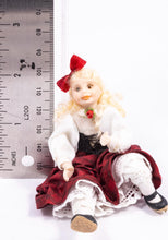 Load image into Gallery viewer, Little Girl Doll in Victorian Red &amp; White Dress with Bow in Long Blonde Hair Sitting Down Pat Melvin Artisan Made
