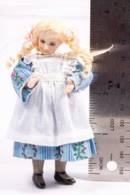 Load image into Gallery viewer, Dollhouse Miniature ~ Artisan Made Porcelain Blonde Hair Little Girl Doll in Apron &amp; Blue Dress
