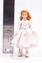 Load image into Gallery viewer, Dollhouse Miniature ~ Curly Auburn Hair Little Girl Doll in Pale Pink Dress with Floral White Apron Pat Melvin Artisan Made
