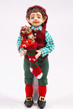 Load image into Gallery viewer, Christmas Elf Porcelain Doll in Checkered Shirt Holding Knitted Stocking Filled with Toys Artisan Made Debra Hammond
