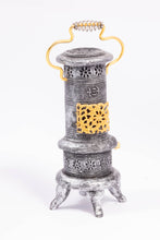 Load image into Gallery viewer, Metal Parlor Stove with Gold Accents
