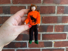Load image into Gallery viewer, Patsy Thomas Brunette Little Girl Doll in Knitted Orange Halloween Sweater
