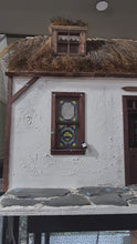 Load and play video in Gallery viewer, Irish Cottage with Thatched Roof &amp; Stained Glass-Style Windows
