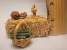 Load image into Gallery viewer, Haybale with Chicken and Cucumbers in Woven Basket

