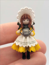 Load image into Gallery viewer, Julie Stevens – Handmade Clay Sunflower Girl Holding Teapot
