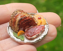 Load image into Gallery viewer, Roast Beef with Sliced Oranges Garnish on Metal Tray
