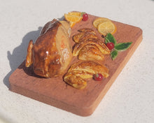 Load image into Gallery viewer, Duck roast with orange slices on board
