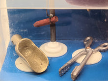 Load image into Gallery viewer, Dollhouse Miniature ~ 1:10 Scale, Dora Kuhn Cucumber Tongs &amp; Shovel in Original Packaging
