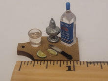Load image into Gallery viewer, Tequila Shot with Lime on Wooden Board
