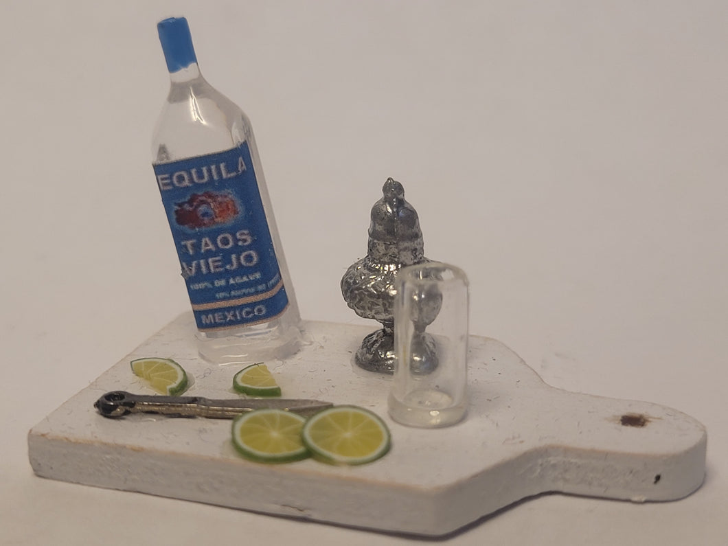 Tequila Shot with Lime on White Wooden Board