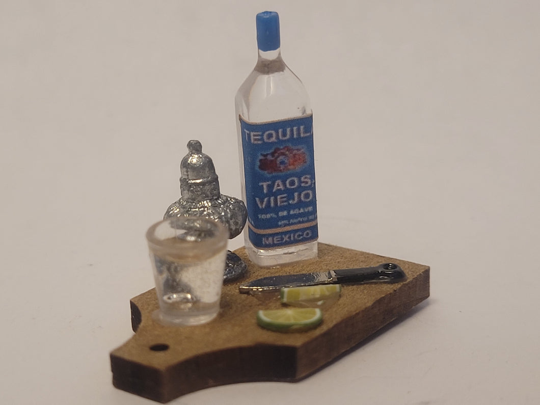 Tequila Shot with Lime on Wooden Board