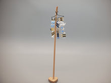 Load image into Gallery viewer, Baby Blue Ribbons &amp; Barrettes on Wooden Stand - by Cheryl Warder
