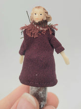 Load image into Gallery viewer, Dollhouse Miniature ~ 1/2&quot; Scale, Female Doll with Red Coat and Scarf with Black Pants &amp; Shoes
