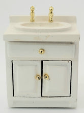 Load image into Gallery viewer, Dollhouse Miniature ~ ½&quot; Scale, White Sink with Gold Fixtures &amp; Drawer Knobs
