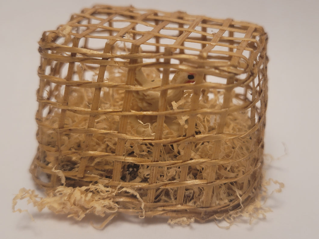 Chicken inside Bamboo Crate