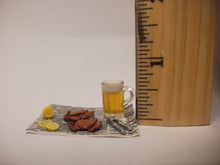 Load image into Gallery viewer, Crabs and Beer with Lemon on Newspaper
