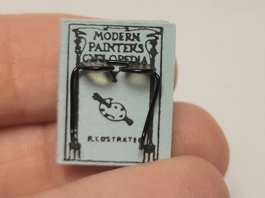 Book with Glasses, 'Modern Painter's Cyclopedia' — IGMA Artisan Al Chandronnait