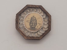 Load image into Gallery viewer, ¾&quot; Sailor&#39;s Valentine - Ship Drawing Emblem Surrounded by Rope and Gray Shells – by Pam Friend
