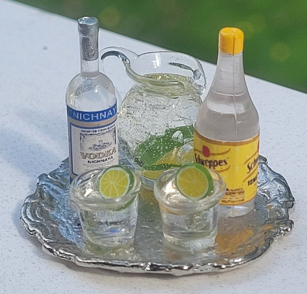 Vodka Tonic with Glasses and Pitcher on Platter