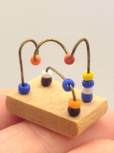 Load image into Gallery viewer, Dollhouse Miniature ~ 1:24 Scale, 2pc Children&#39;s Playset - Toy Crib and Bead Rollercoaster – S. Hoeltge
