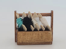 Load image into Gallery viewer, Al Chandronnait – Wooden Box Holding Fabric
