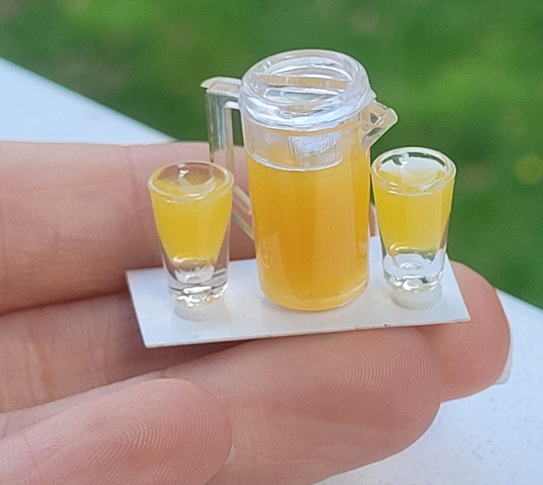 Orange Juice in Pitcher with 2 Glasses