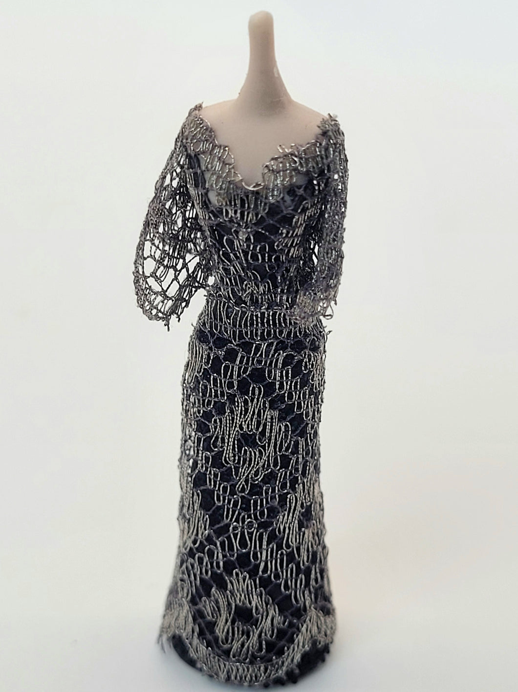 Handmade Black and Silver Dress on Porcelain Mannequin